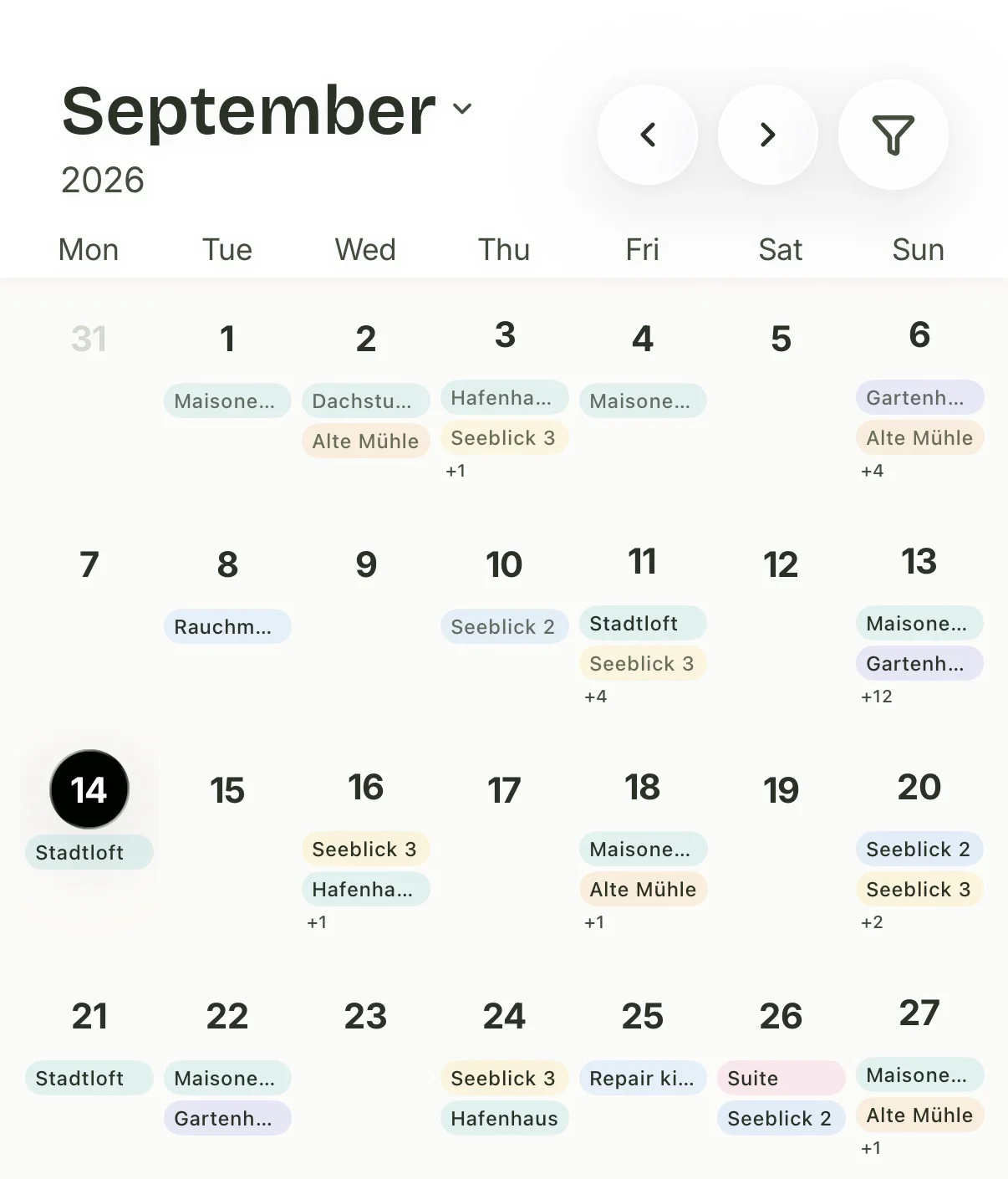 Staymaker's month calendar showing cleanings across several properties, with overlapping stays flagged.