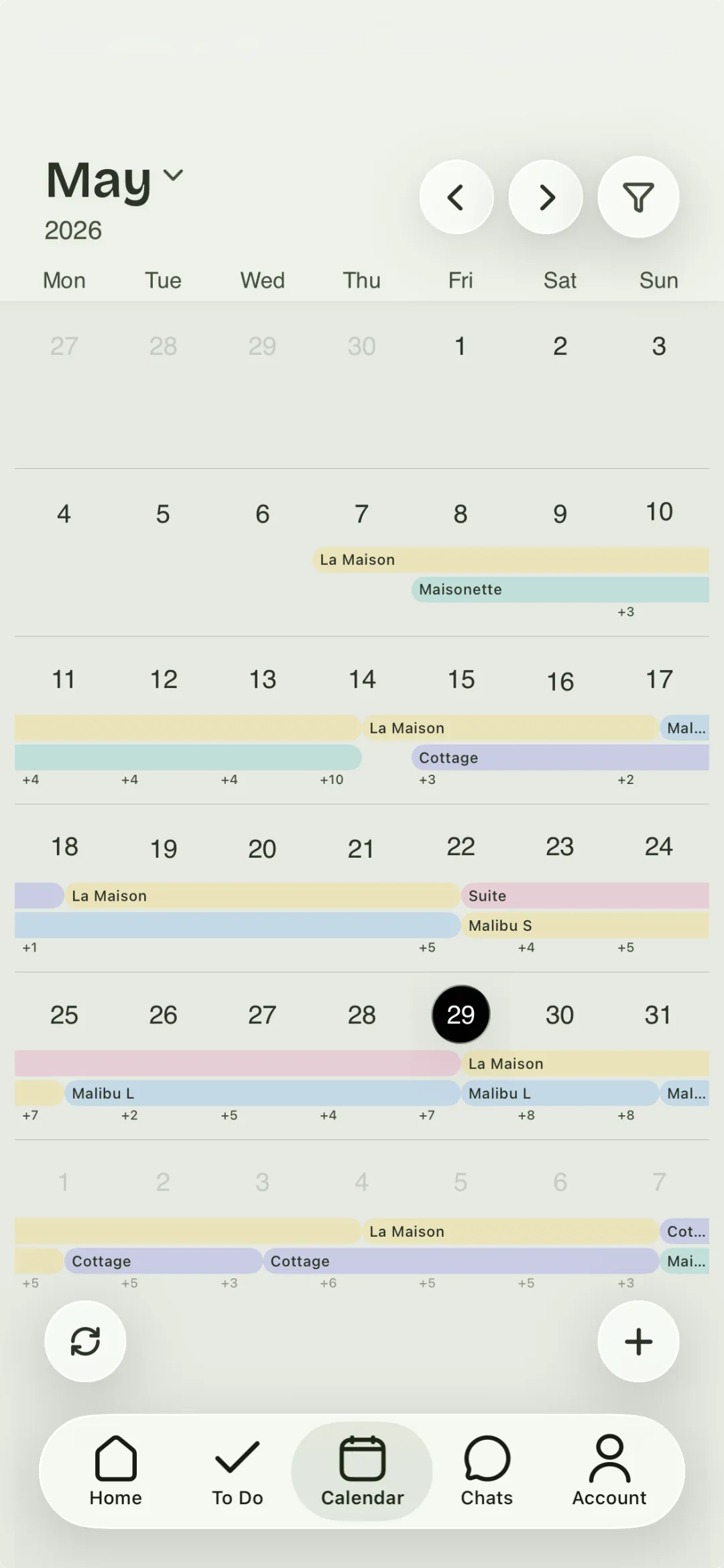 Staymaker's month calendar showing cleanings across several properties, with overlapping stays flagged.